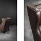Brown leather wingback chair in mid-century modern Danish style, 1960s.
