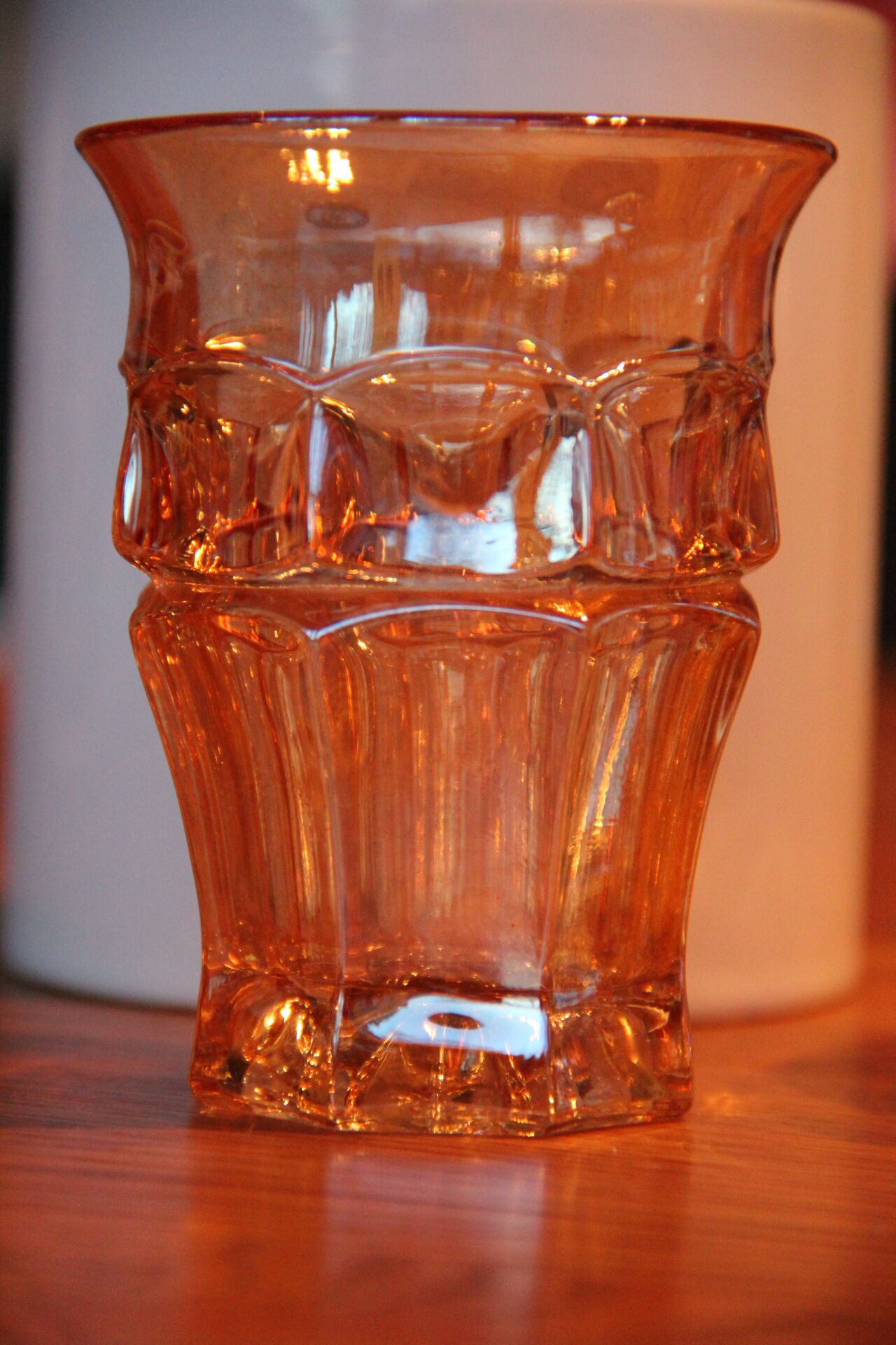 Pourer and her four orange-pink glasses