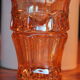 Pourer and her four orange-pink glasses