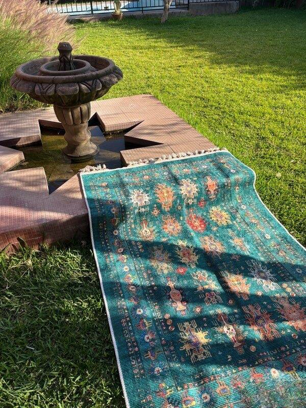 Modern rug with traditional Eastern patterns available for delivery only.