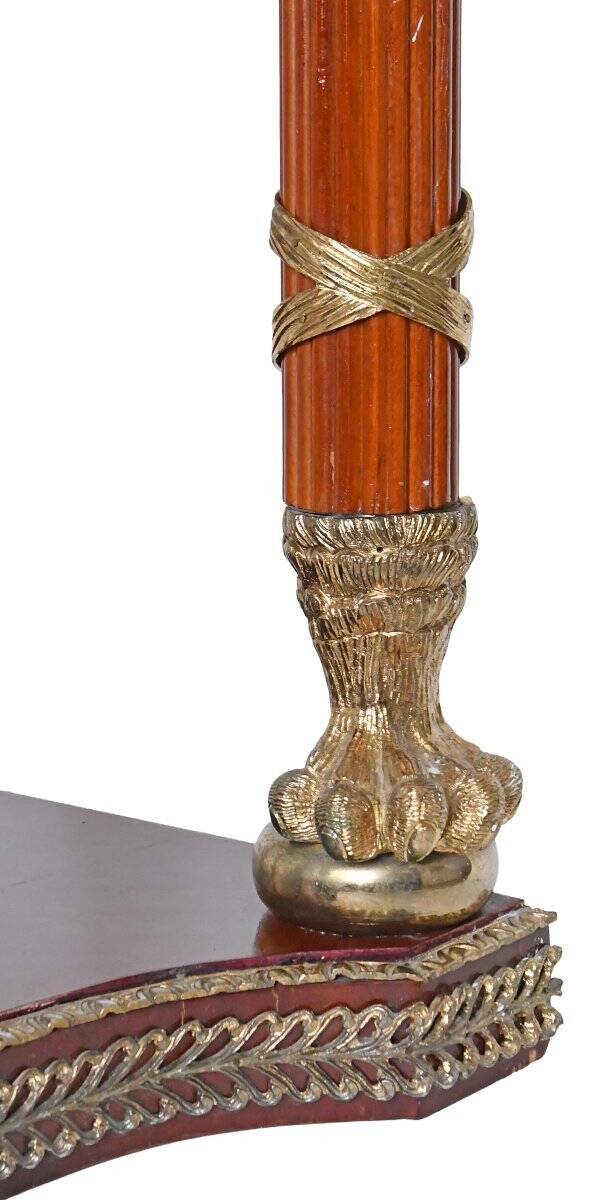 Console topped with an Empire-style mirror.