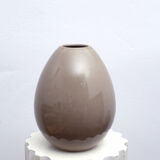 Beige ceramic vase egg shape