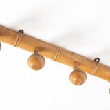 Light wood coat hooks 1900