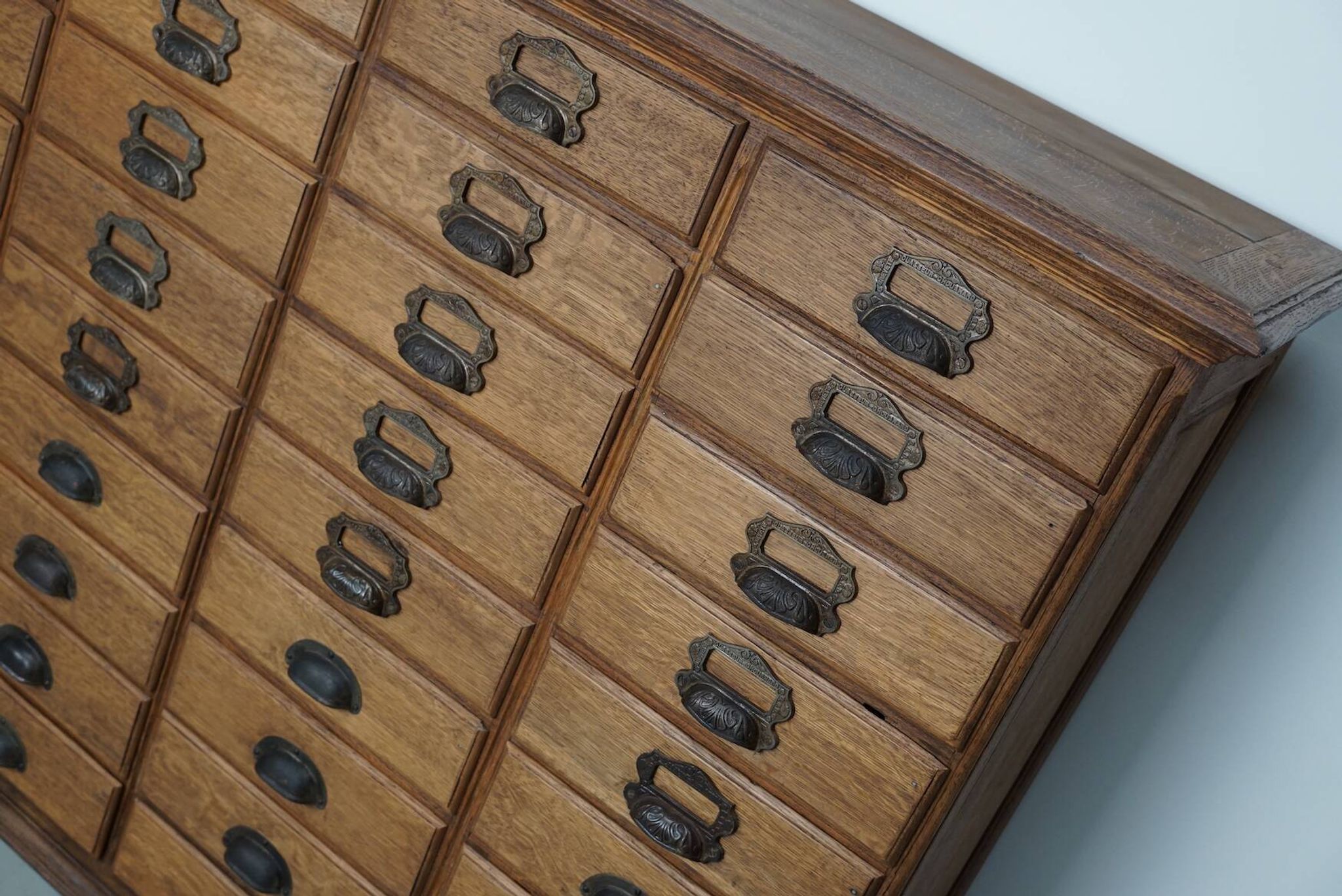 Antique French oak filing / apothecary cabinet by Chouanard, ca 1910