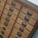 Antique French oak filing / apothecary cabinet by Chouanard, ca 1910