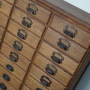 Antique French oak filing / apothecary cabinet by Chouanard, ca 1910