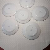 6 flat plates with floral decoration, T. de fer.