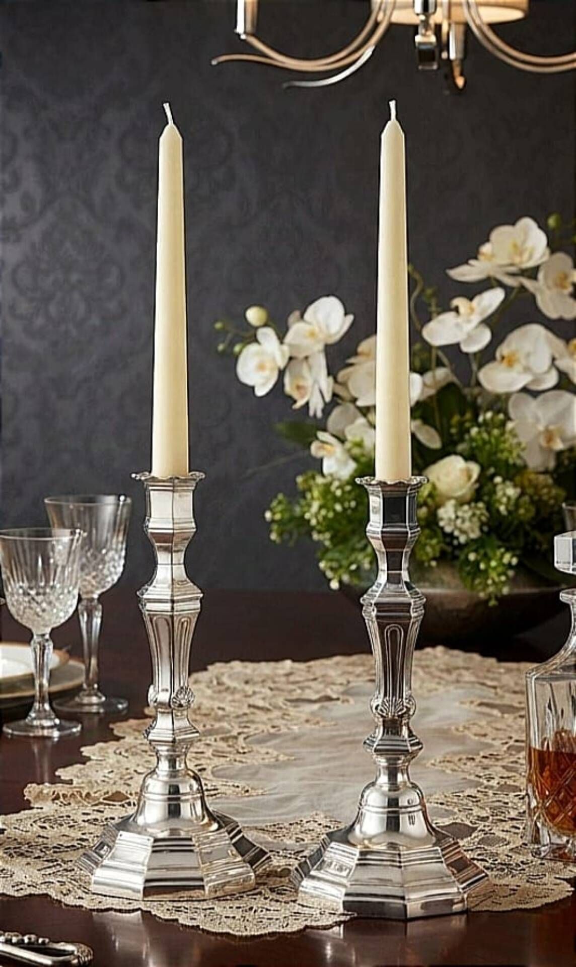 Magnificent pair of silver candlesticks.