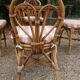 dining table and chairs made of curved bamboo and rattan with smoked glass from the 1970s