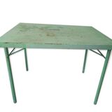 Green garden table in patinated metal