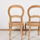 Paire de chaises cannées, en bois