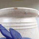 Old earthenware pitcher with its lid