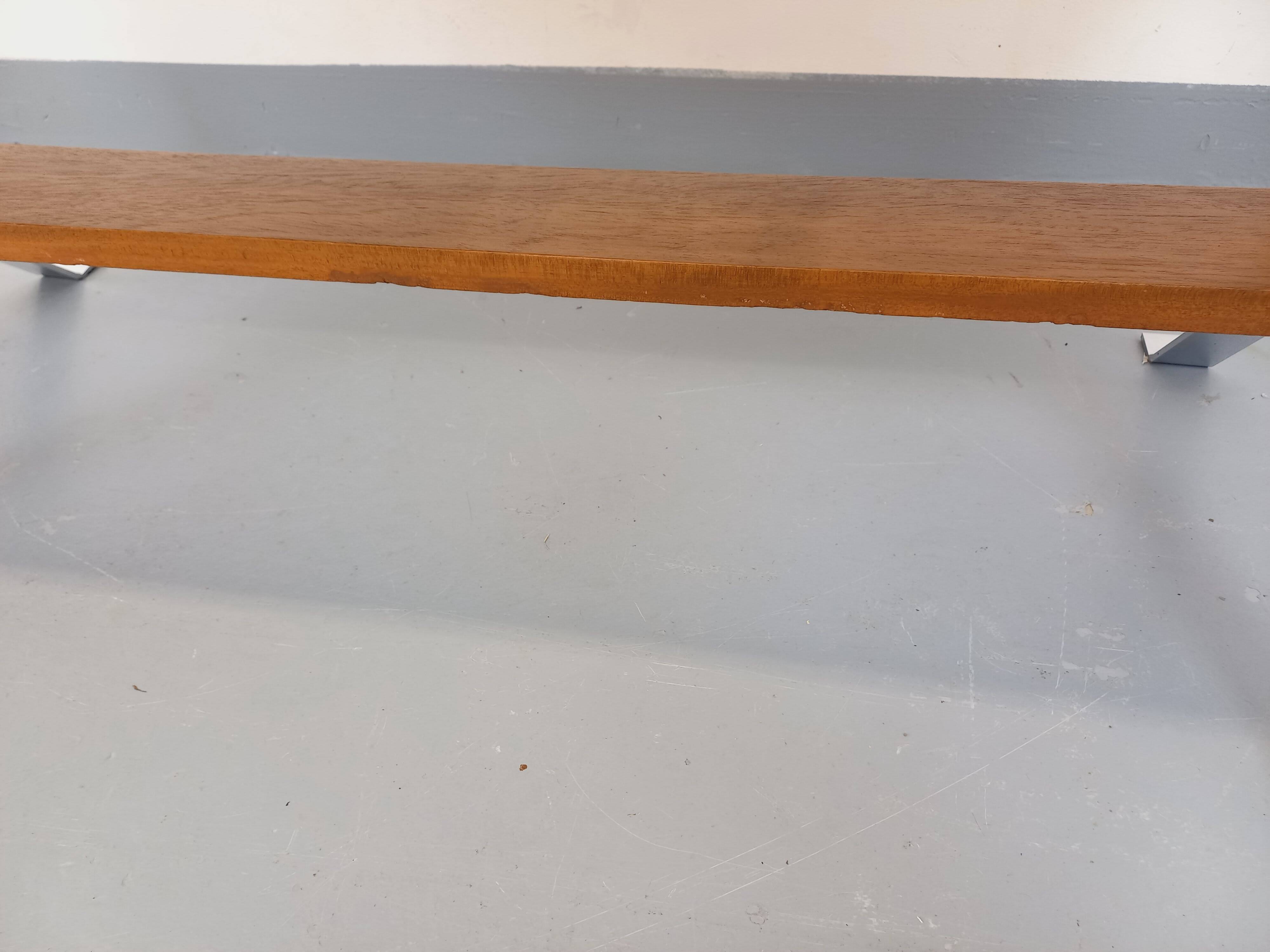Vintage coffee table from the 60s and 70s in ceramic, chrome metal, and wood.