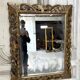 Miroir en bois sculpté doré XIXe siècle