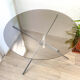 Round tripod table in smoked glass Roche Bobois 70