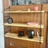 Pretty String shelf in very good condition.