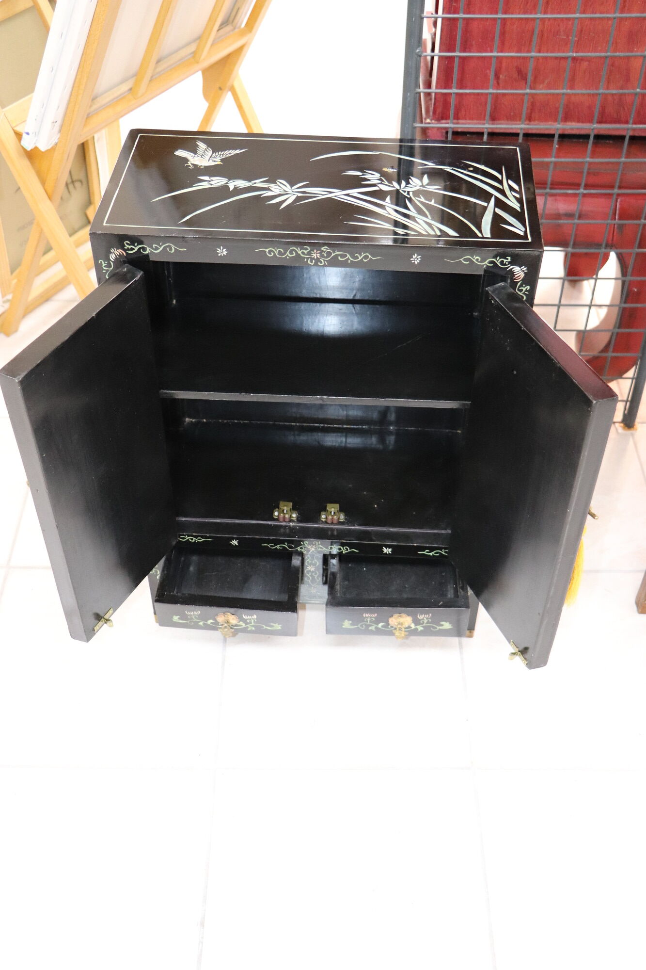 Small storage cabinet or bedside table lacquered black incised and painted