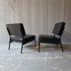 2 faux leather armchairs