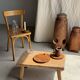 Average circular teak monoxyle chopping board with handle 26 x 18.