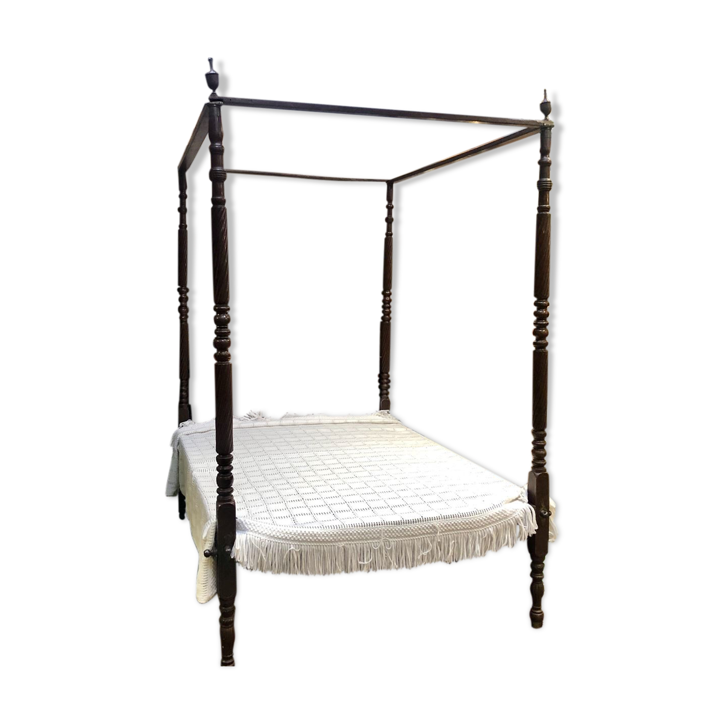 Four-poster bed in late 19th century mahogany