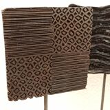 Set of three old ink pads on base