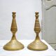 Pair of vintage candle holders in golden brass