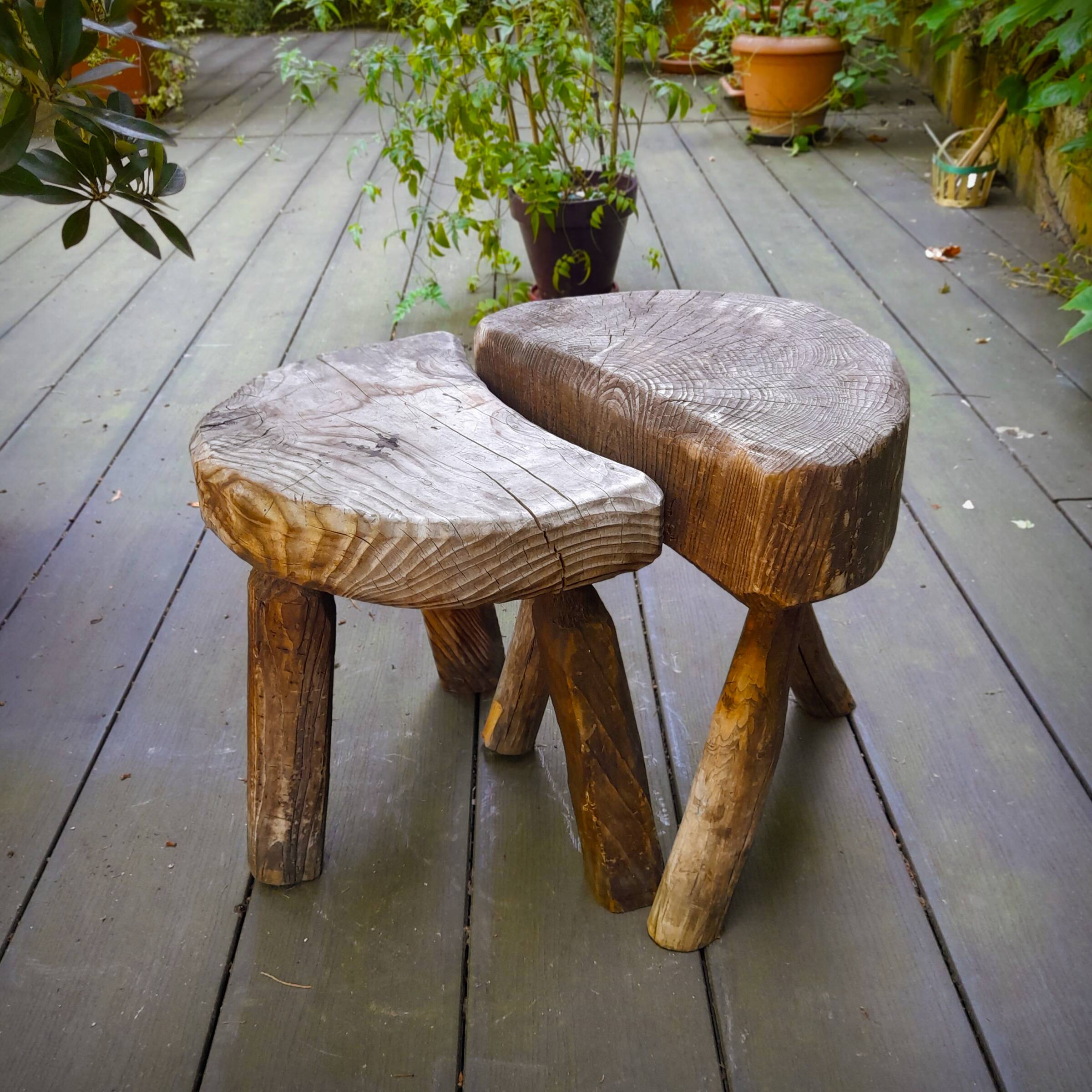 Pair of brutalist tripod stools in grayed pine. France, 1950s