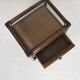 Rattan and cane bedside table, smoked glass top