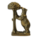 Brass sculpture, bear looking for honey in the tree