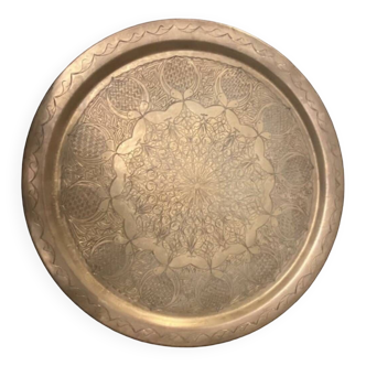 Old oriental tray in yellow copper