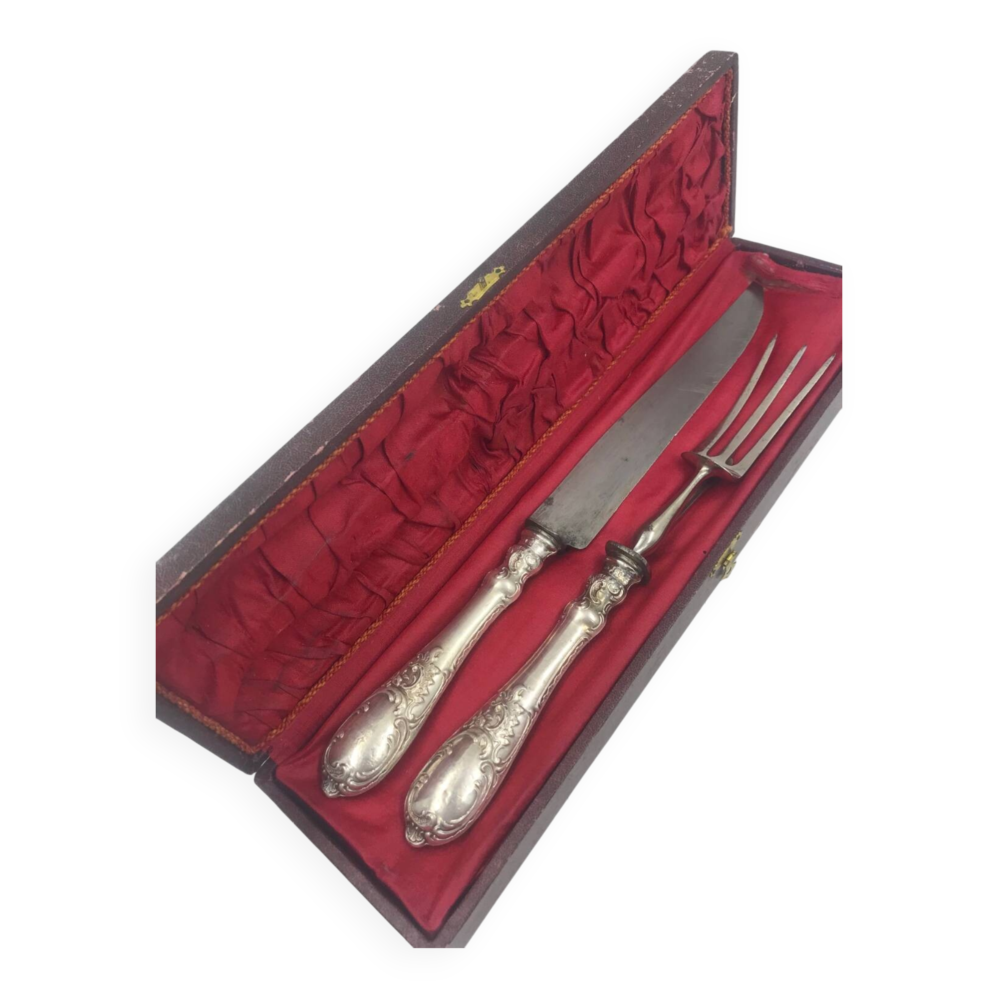 Antique silver-plated metal serving cutlery.