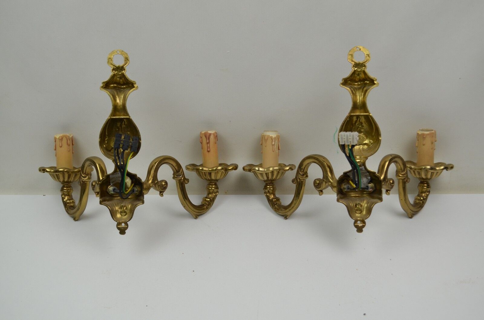 Pair of wall lamps with two lights in Louis XV style bronze
