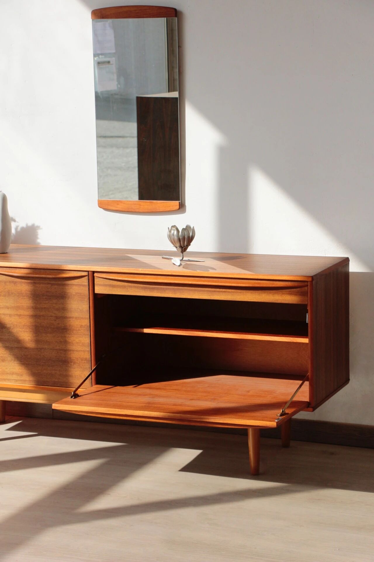 Vintage zebrano and walnut furniture from Morris of Glasgow.