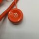 Téléphone bakélite vintage orange