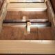 Round solid oak table with extensions, cabinetmaker's sliding mechanism,