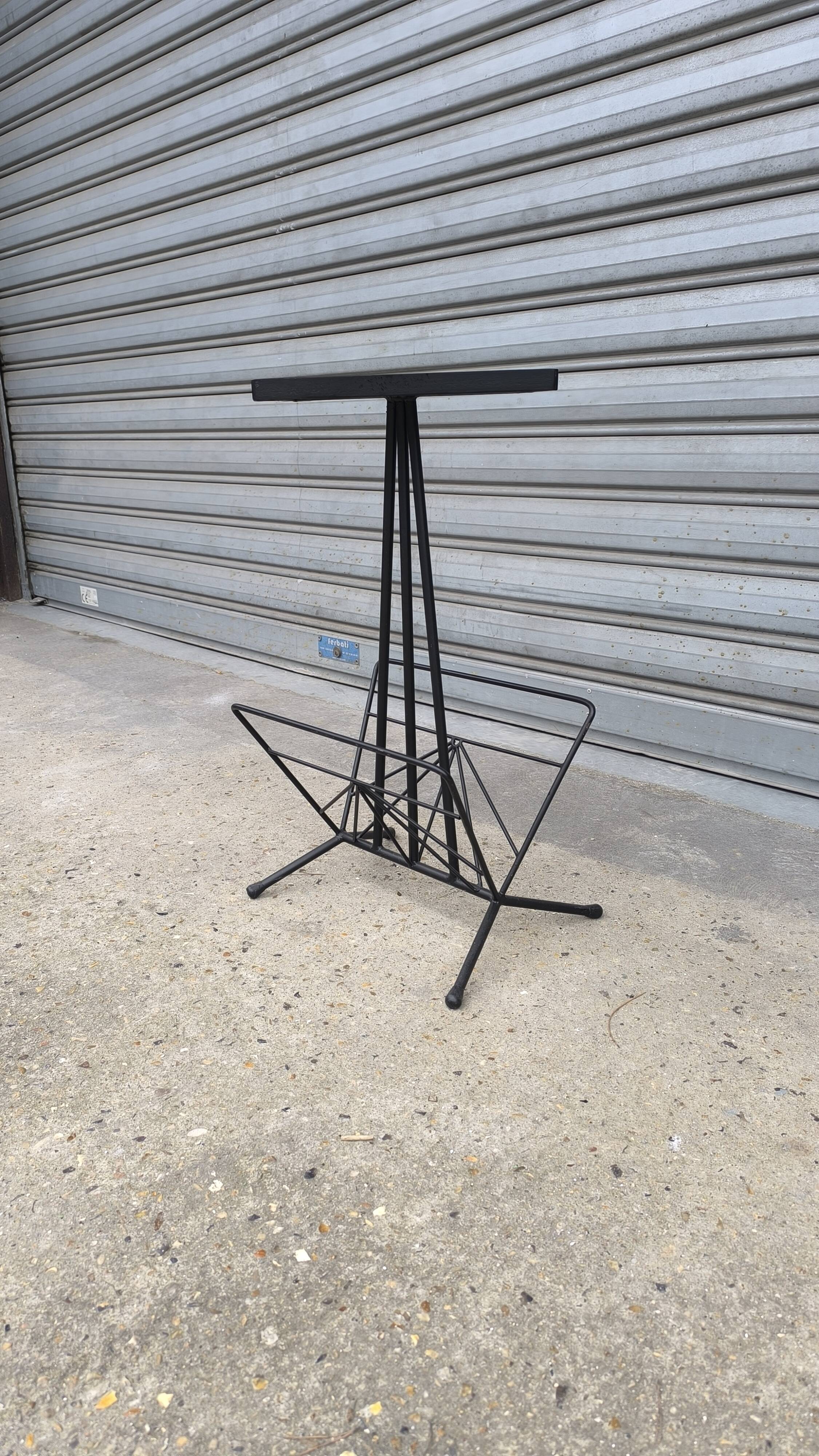 Iron and earthenware magazine rack, 1970