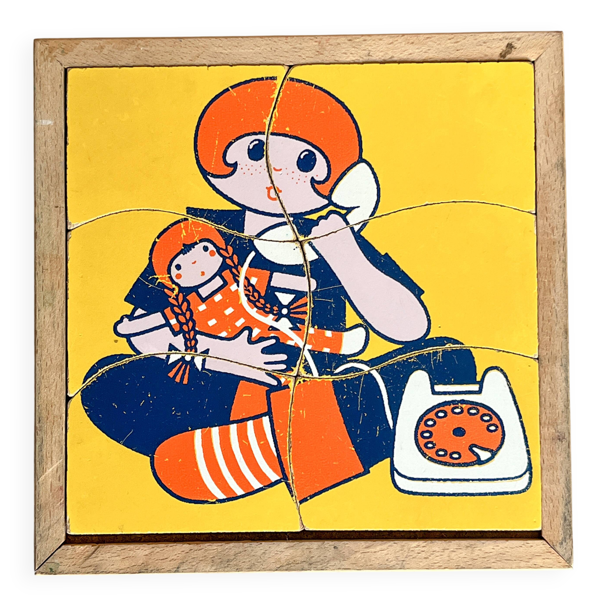 Wooden frame puzzle from the 60s/70s depicting a young girl.