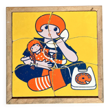 Wooden frame puzzle from the 60s/70s depicting a young girl.