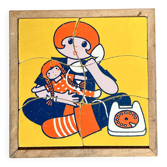 Wooden frame puzzle from the 60s/70s depicting a young girl.