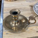 Brass thumb candle holder