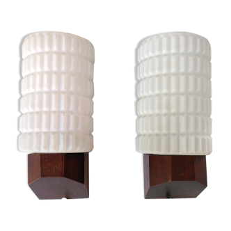 Opaline and teak sconces