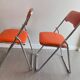Chaises pliantes vintage chrome / skaï orange Soudexvinyl
