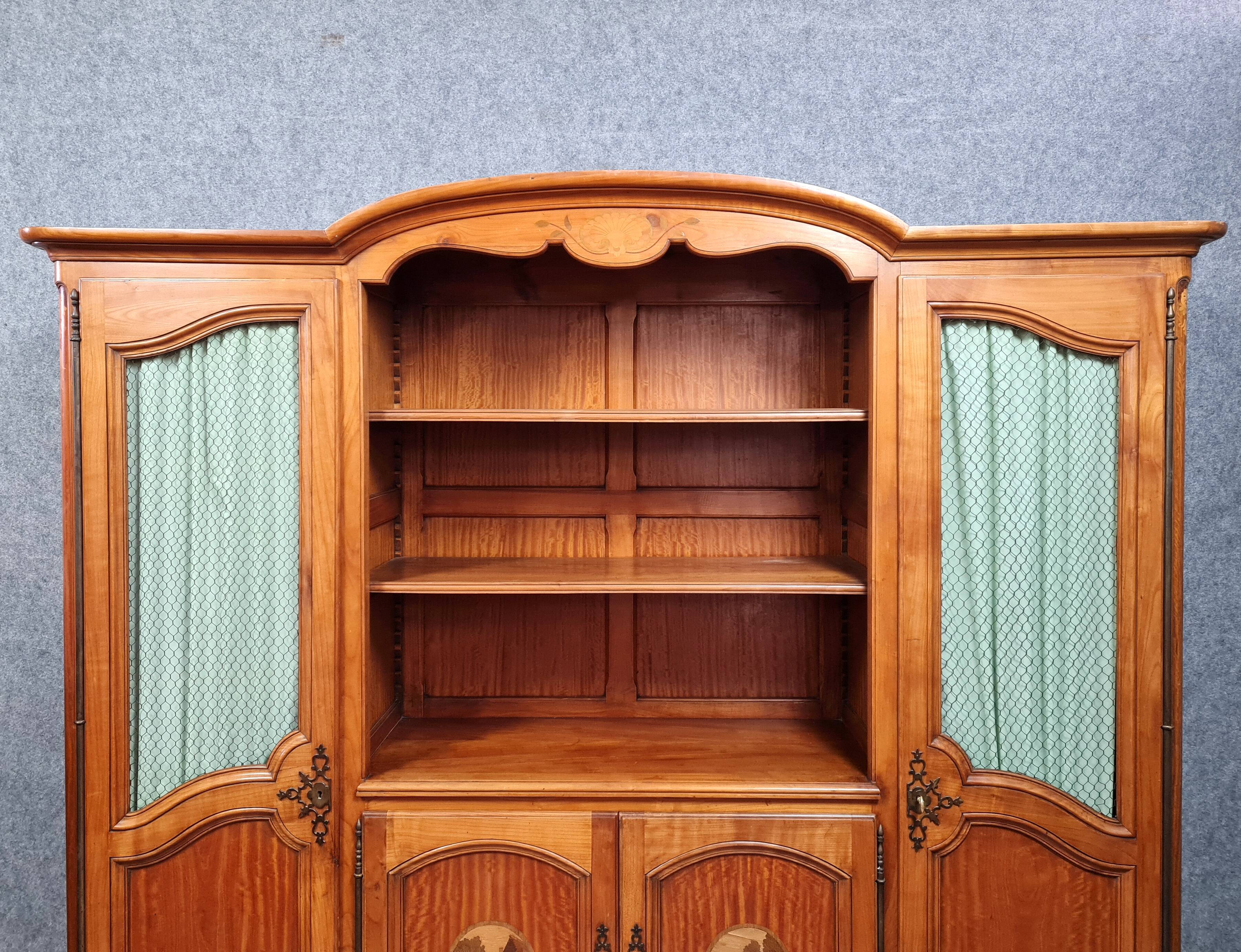 Louis XV style bookcase in marquetry and fine wood circa 1850