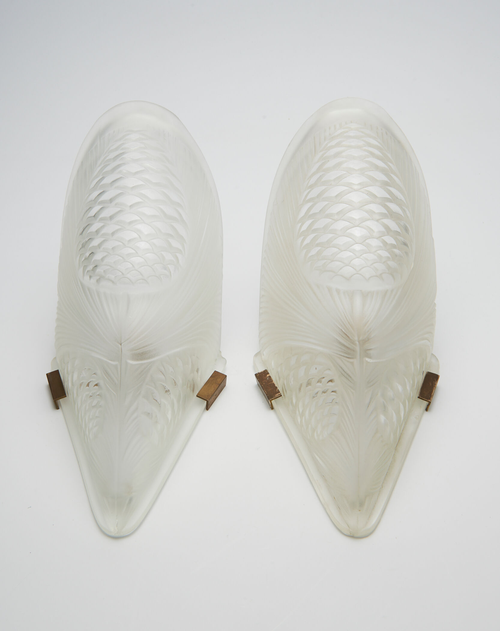 Pair of art deco wall lamps with pine cone pattern