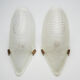 Pair of art deco wall lamps with pine cone pattern
