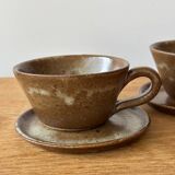 Vintage stoneware cups and saucers
