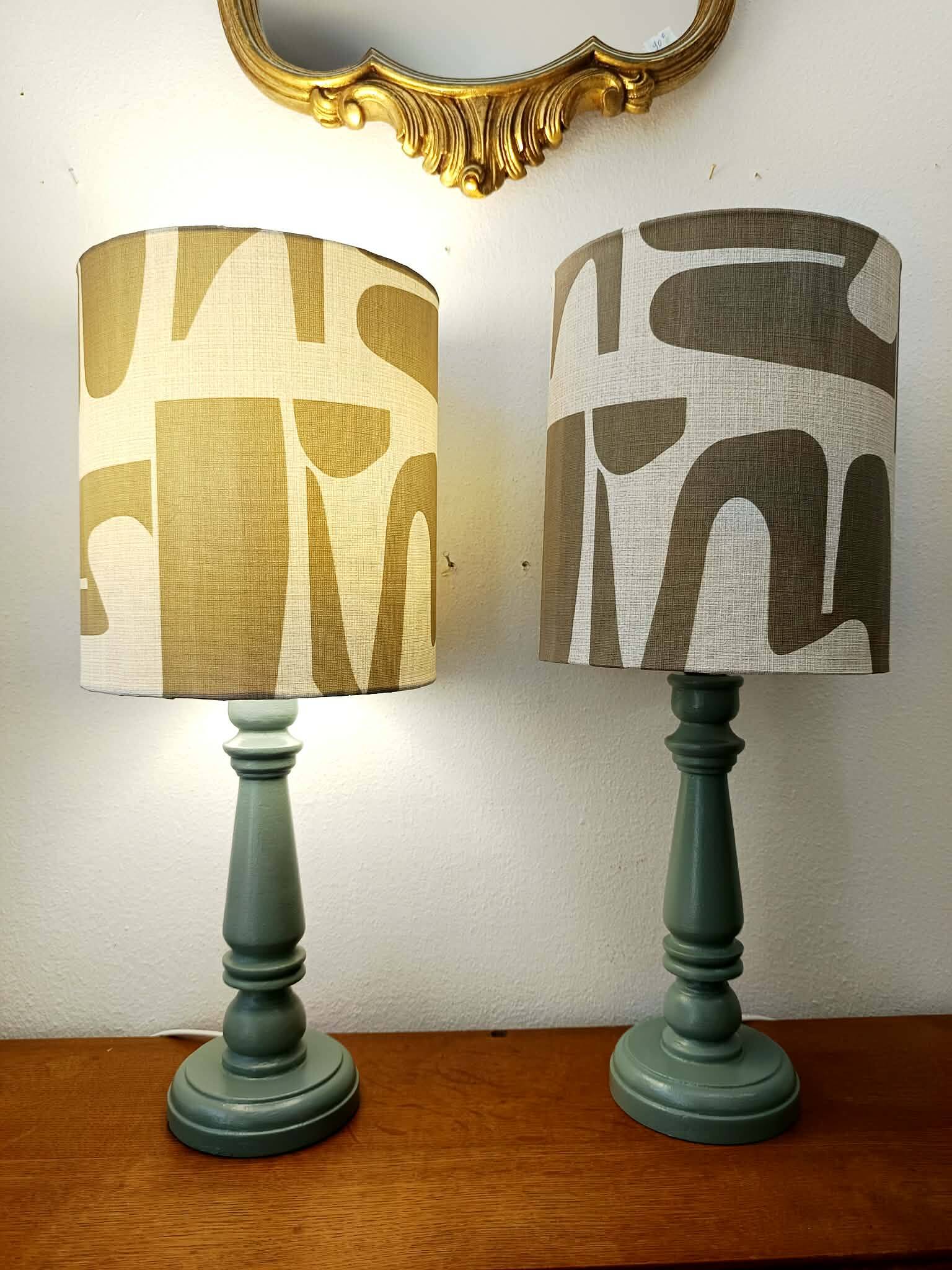 Pair of wooden lamps with custom modernist lampshades.