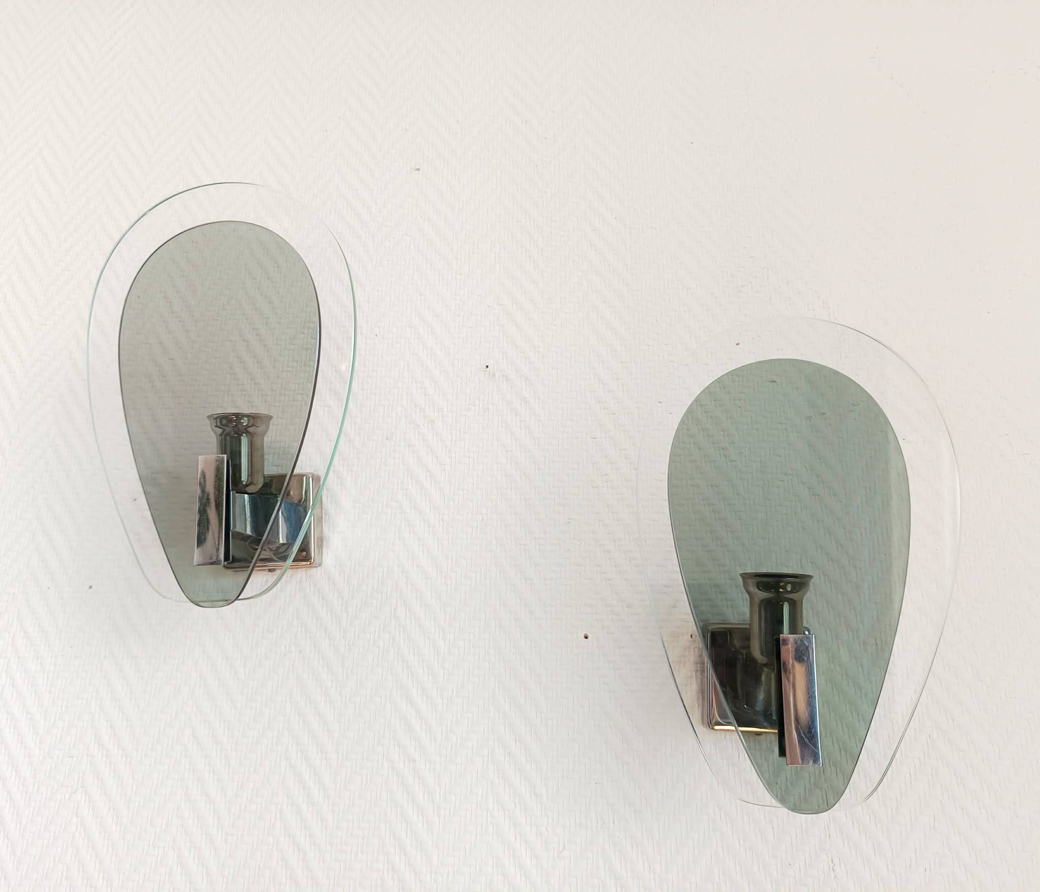Pair of space age wall lights with smoked glass from the 1970s.