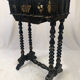 Napoleon III work table in blackened burgundy wood with gilded highlights.