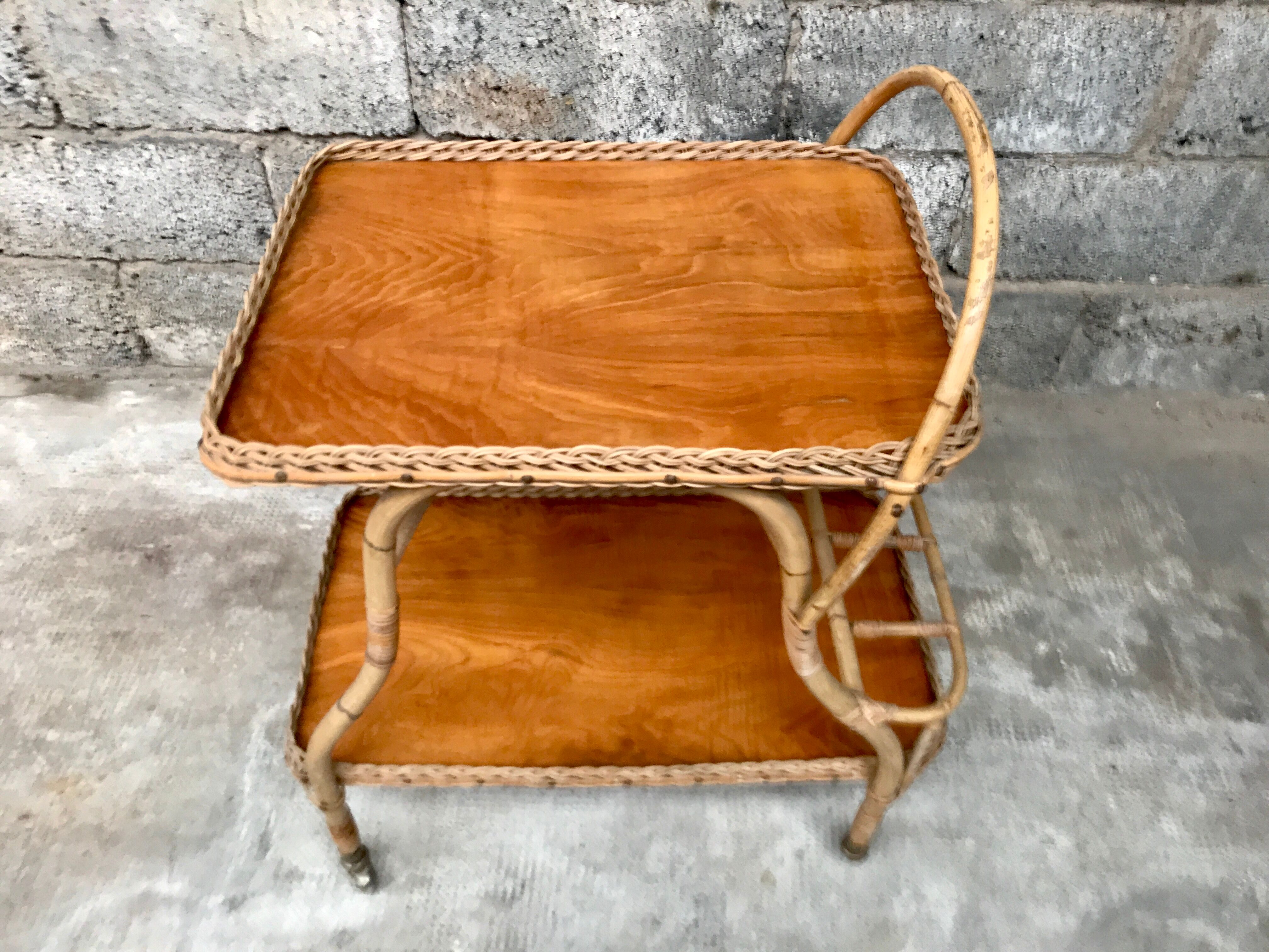 Rolling dessert in woven wicker bamboo rattan with 1950 bottle holder